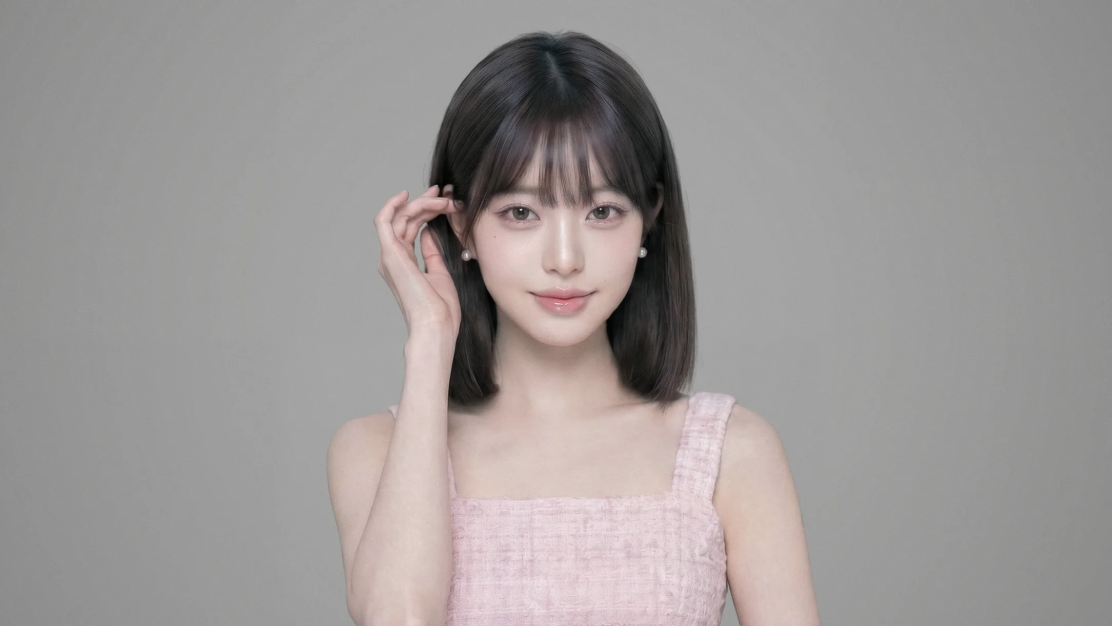 小鼻縮小のメインビジュアル、鼻と顔の中心部を示す女性の正面ポートレート